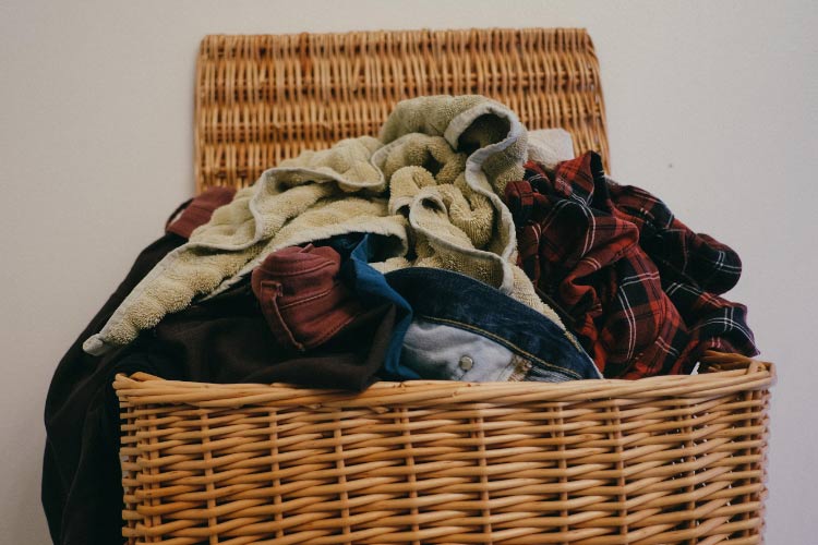 Dirty clothes reach the hamper in one swift motion rather than decorating the floor