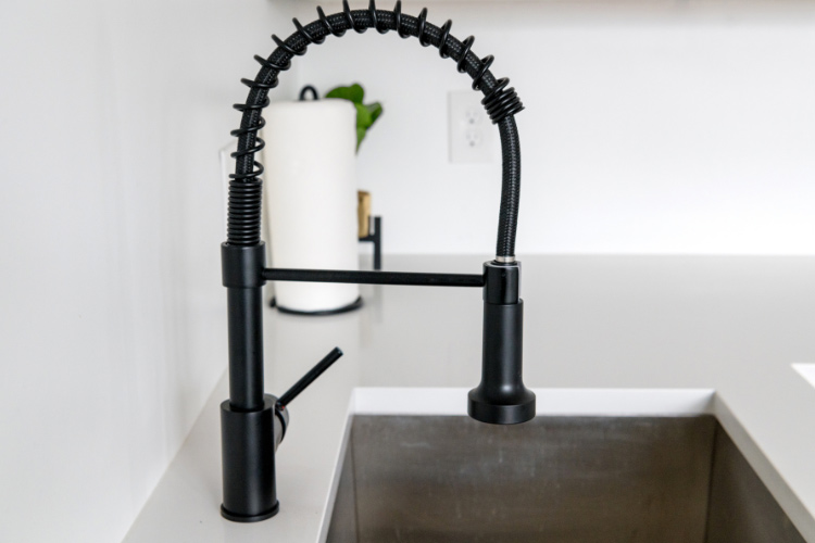 You can balance the softness with some black details and matching black plumbing fixtures
