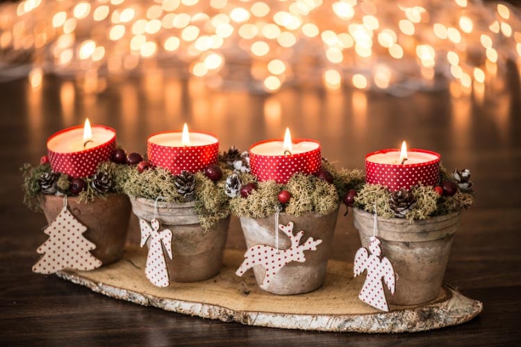 Strategically place festive candles in cozy corners or windowsills