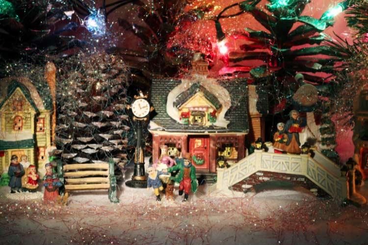 A mini Christmas village is another one of the Christmas mantel decor ideas