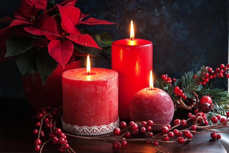 cluster some candles together and pair them with ornaments and greenery