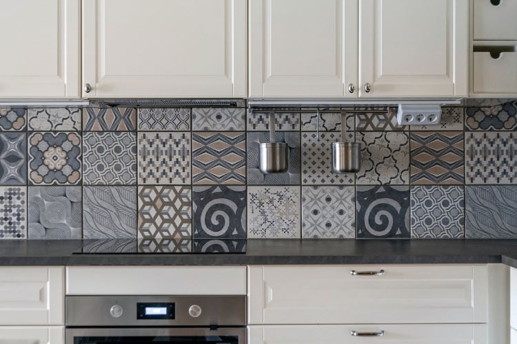 a statement backsplash elevates the room without making it feel cramped