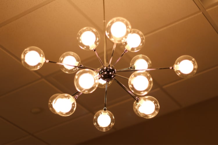 You can make just as big a statement with lighting as you can with flashy wallpaper