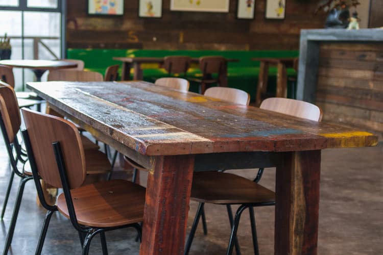 Go for a natural look or choose white or pastel distressing to anchor the room